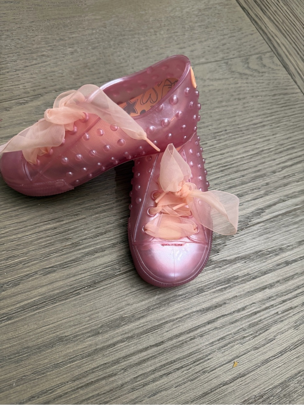 Mini Melissa Pink Pearlized Jelly Sneakers with Peach Sheer Bows